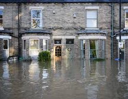 Responsibilities for a flooded property occupied by a tenant?